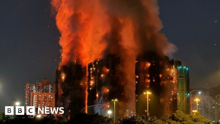 At least 65 dead and hundreds missing after fire engulfs tower blocks